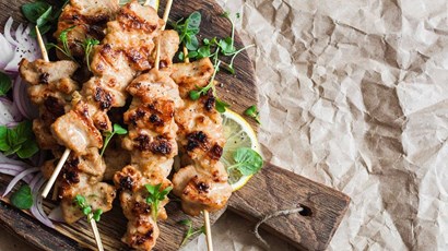 Chicken kebabs, sweet potato fries and slaw